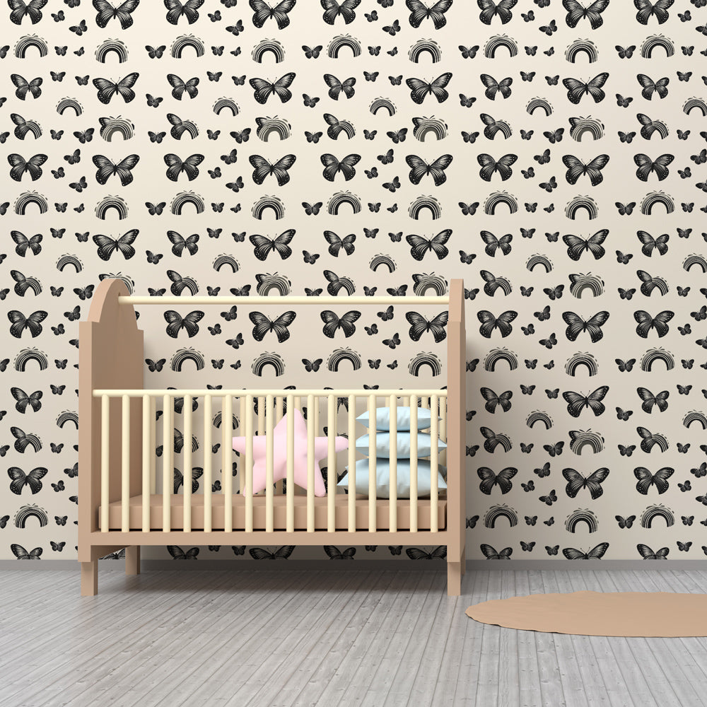 Delicate butterfly and rainbow wallpaper creating magical kids bedroom atmosphere