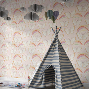 Pink butterfly wallpaper creating magical children's bedroom decor with rainbow accents