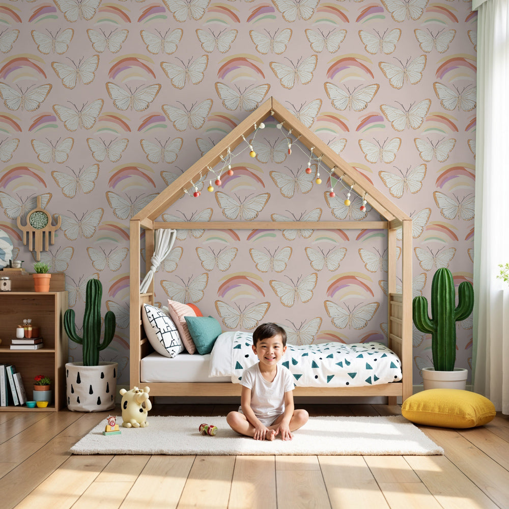 Delicate butterfly rainbow mural wallpaper in soft pink nursery by Kids-Mundo