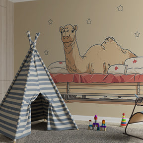 Camel themed mural wallpaper with stars and cushions for children's playroom by Kids-Mundo