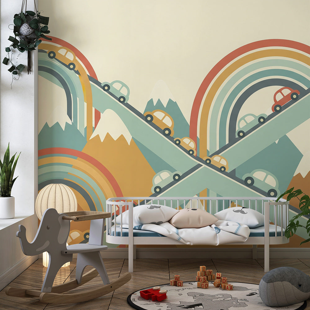 Kids-Mundo rainbow road cars wall mural energising a playroom with mountains and movement.