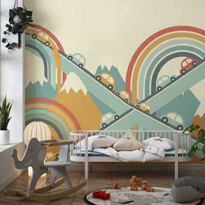 Kids-Mundo rainbow road cars wall mural energising a playroom with mountains and movement.