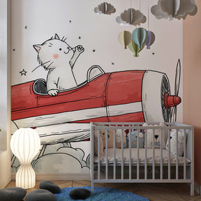 Aviation themed kids bedroom featuring cat pilot mural wallpaper with clouds and stars