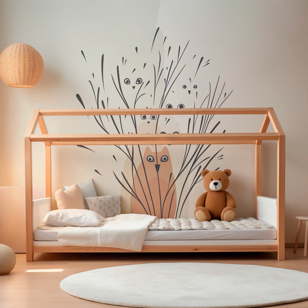 Playful cat and bird wallpaper transforming children's playroom with nature-inspired design