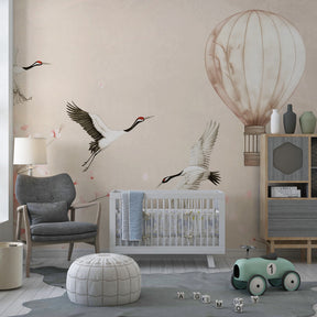 Crane birds and balloon wallpaper creating serene children's bedroom atmosphere