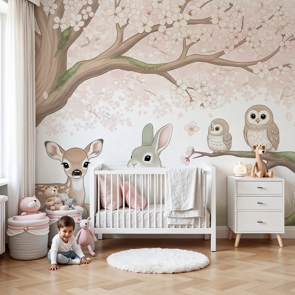 Kids-Mundo cherry blossom woodland wall mural with fawn, bunny and owls in a soft pastel nursery.