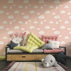 Whimsical cloud balloon mural wallpaper in bright kids playroom setting