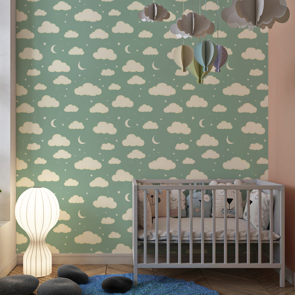 Soft green cloud wallpaper with crescent moons decorating modern kids bedroom by Kids-Mundo