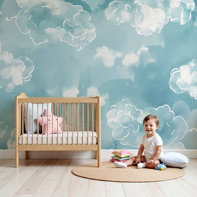 Pastel blue watercolor cloud mural wallpaper in modern nursery by Kids-Mundo