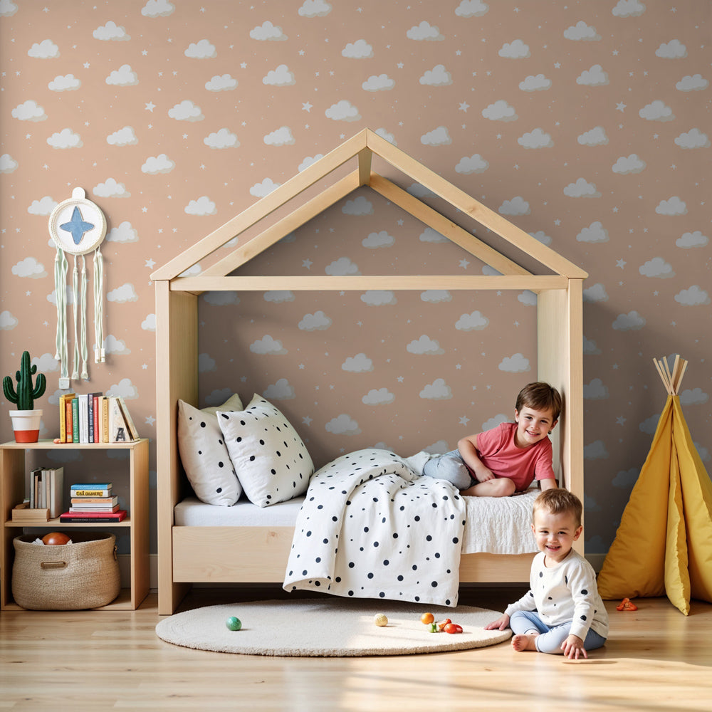 Cloud mural wallpaper in peach pink tones decorating modern nursery room by Kids-Mundo