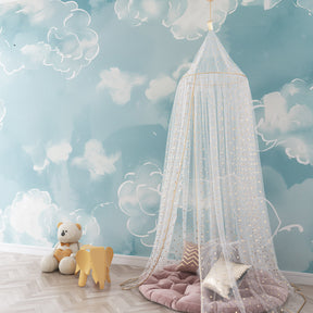 Watercolor cloud mural wallpaper transforming toddler room into peaceful sky