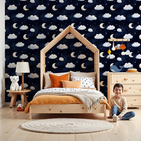Dreamy clouds and moon mural wallpaper in cozy nursery setting by Kids-Mundo