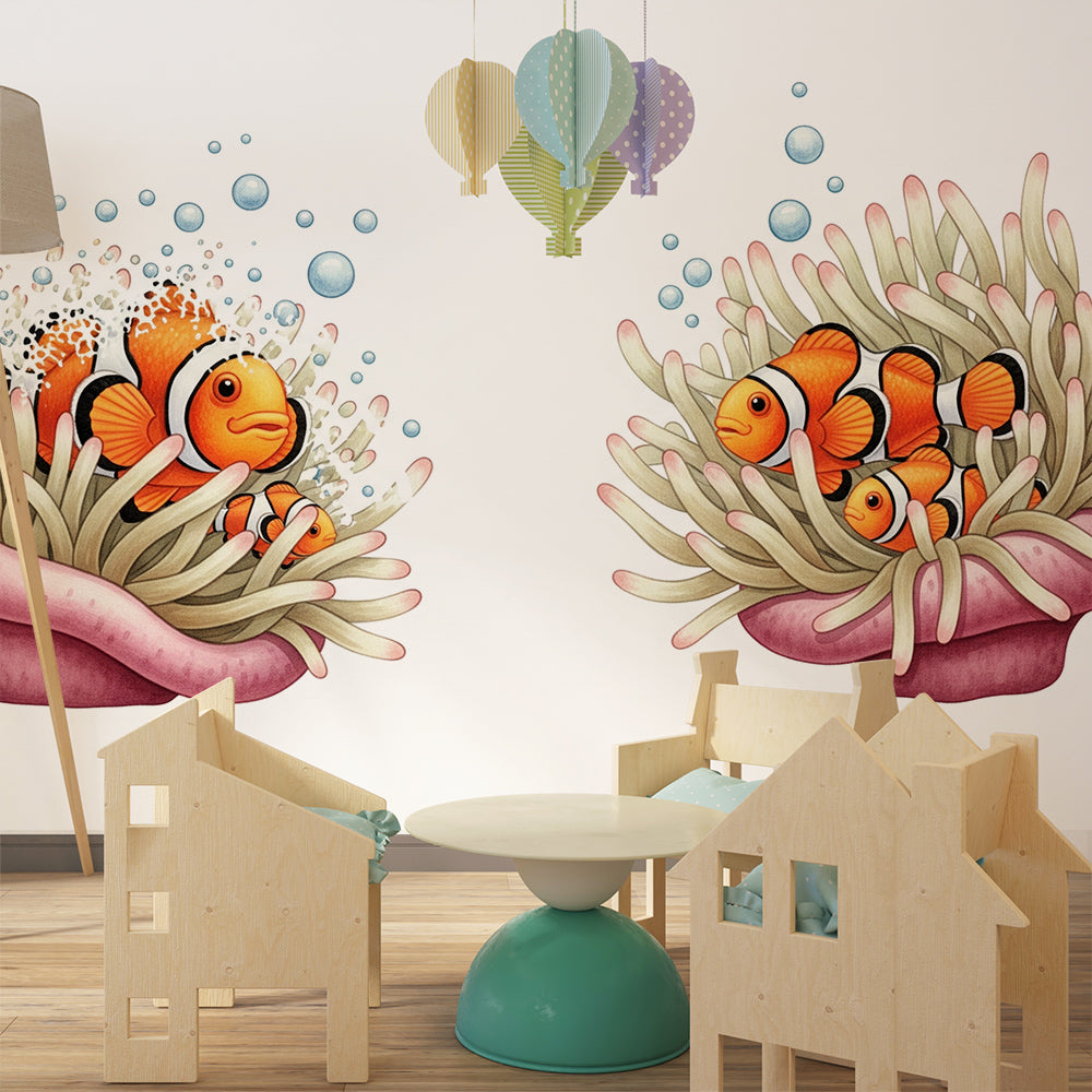 Kids-Mundo clownfish wall mural covering a playroom wall with toy baskets nearby