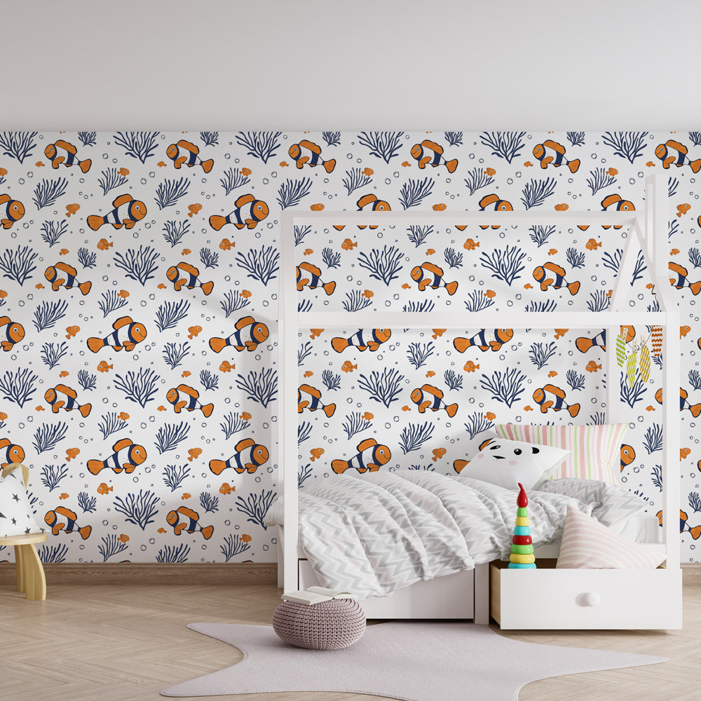 Colorful clownfish and coral mural wallpaper creating underwater theme in children's bedroom