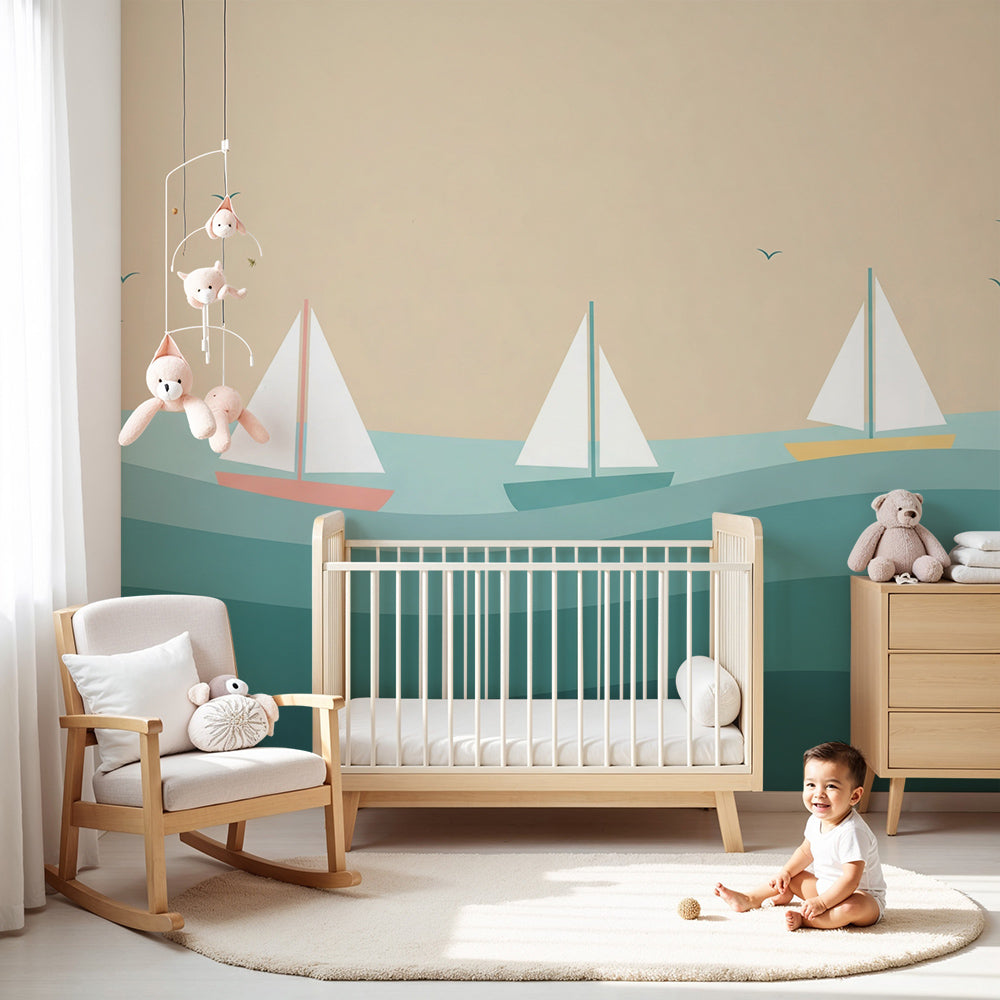 Kids-Mundo sailboat wall mural in a cream nursery behind a cot with layered wave bands
