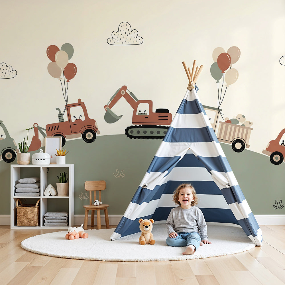 Kids-Mundo construction trucks and balloons wall mural styled in a soft pastel nursery corner