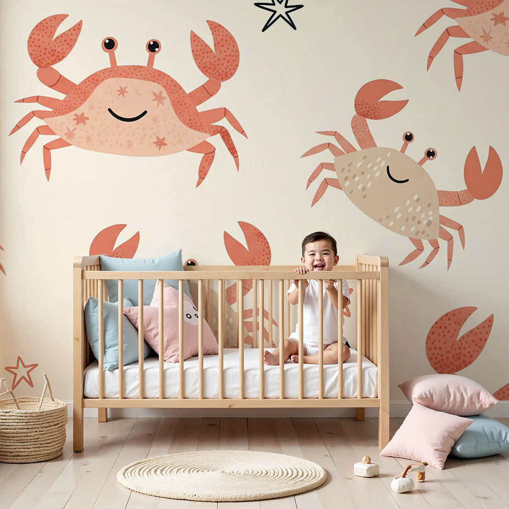 Kids-Mundo crab and starfish wall mural styled on a cream nursery wall behind a cot