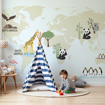 Kids-Mundo cream world map wall mural in a calm blue nursery with cot and toys
