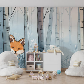 Blue forest fox mural wallpaper transforming kids playroom into winter wonderland