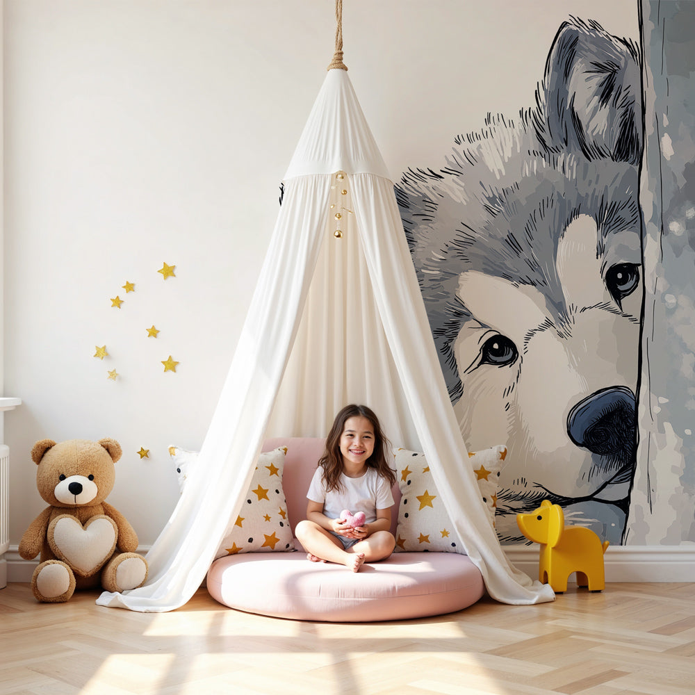 Kids-Mundo curious wolf peeking through snow wall mural styled in a soft grey nursery