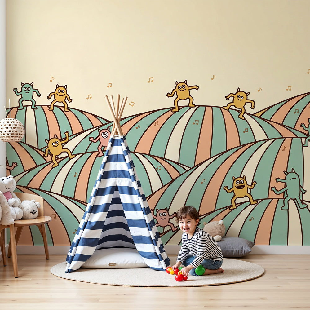 Nursery wall featuring a Kids-Mundo dancing monster wall mural with colourful striped hills nearby.