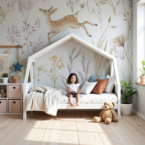 Leaping deer floral mural wallpaper in soft nursery with natural wood crib by Kids-Mundo
