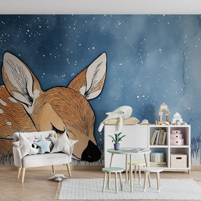 Woodland deer wallpaper in cozy baby bedroom with natural wood furniture and soft lighting