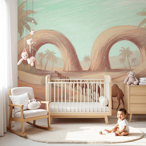Desert adventure wallpaper featuring camel caravan in warm pastel tones for kids playroom