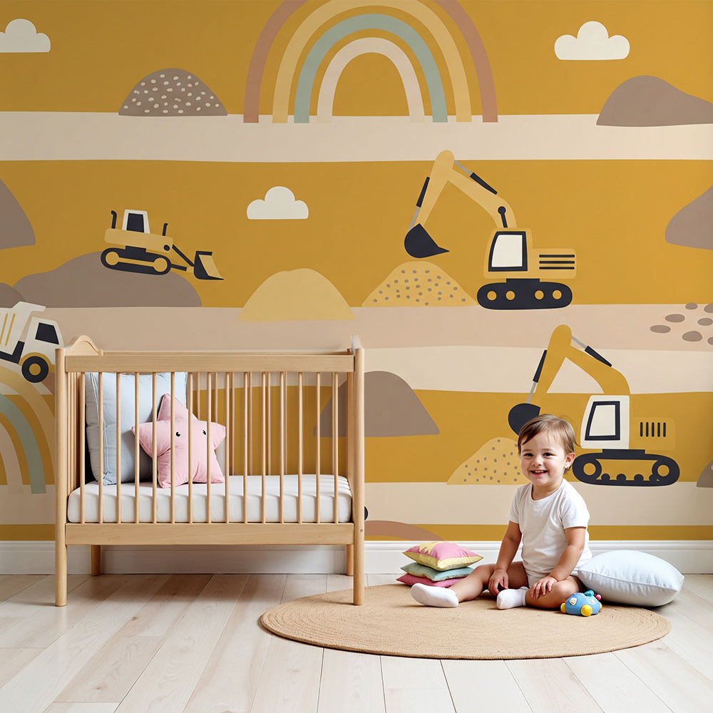 Kids-Mundo digger and dump truck wall mural in a bright nursery with mustard tones and pastel rainbows