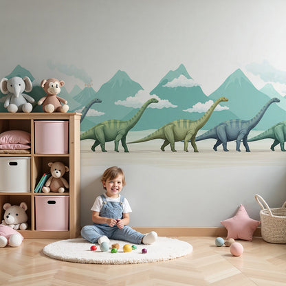 Kids-Mundo dinosaur mountain wall mural in a calm nursery with soft grey furnishings and morning light.