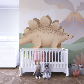 Friendly dinosaur wallpaper with volcano scene decorating children's bedroom wall by Kids-Mundo