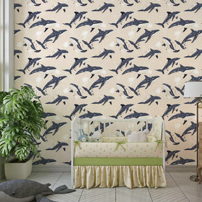 Sandy beige dolphin mural wallpaper complementing nautical themed kids room decor