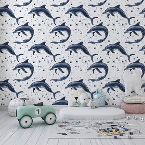 Marine themed children's bedroom featuring playful dolphin mural wallpaper by Kids-Mundo