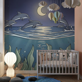 Marine life mural wallpaper with dolphins and corals in bright kids playroom