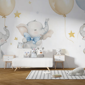 Multicolored elephant wallpaper creating magical atmosphere in baby bedroom decor