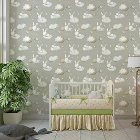 Starry night rabbits wallpaper with grey and gold tones in elegant toddler room setting