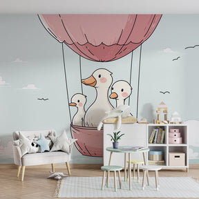 Pastel duck balloon wallpaper decorating modern baby bedroom with soft blue and pink tones