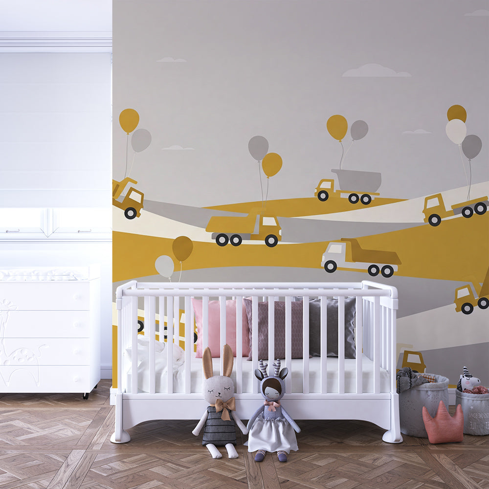 Kids-Mundo dump truck and balloon wall mural brightening a lively children's playroom.