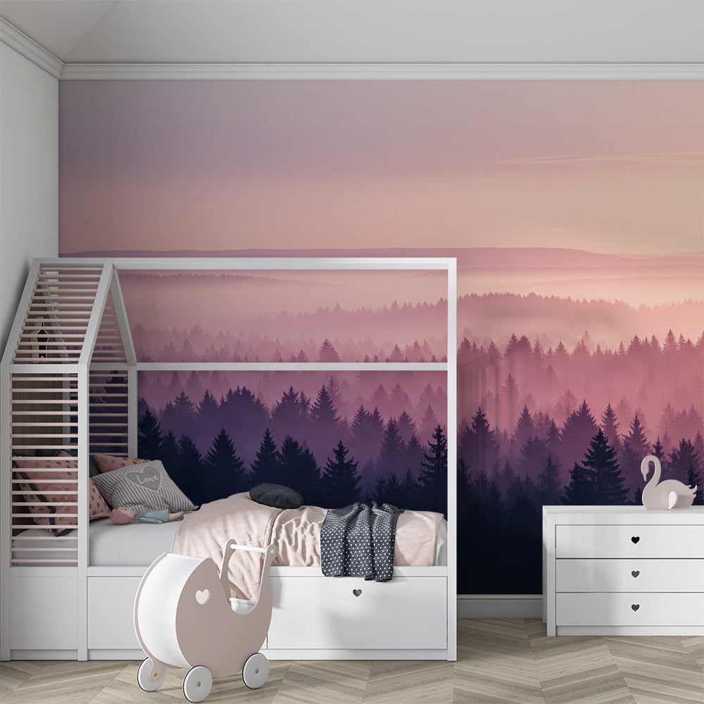 Kids-Mundo misty forest wall mural behind a bed in a soft pink and blue kids bedroom