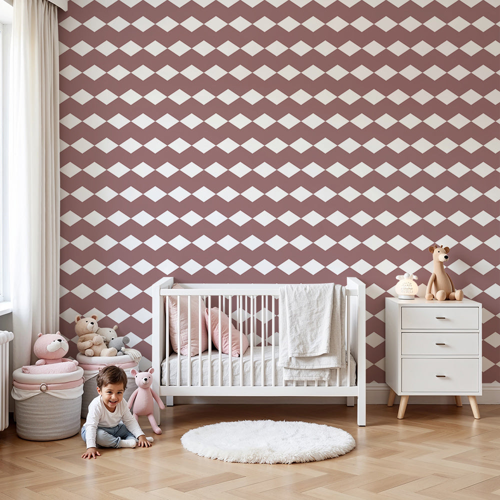Kids-Mundo dusty terracotta diamond wall mural fitted behind a cot in a soft nursery