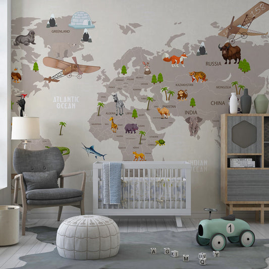 Kids-Mundo animal world map mural covering a kids bedroom wall, showing labelled countries, oceans and wildlife