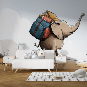 Adventure-themed elephant mural wallpaper with backpack in bright kids playroom setting