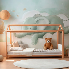 Dreamy elephant sleeping on cloud wallpaper creating peaceful baby bedroom decor