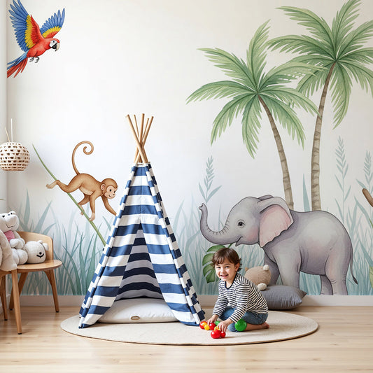 Kids-Mundo elephant monkey and macaw jungle wall mural on a nursery wall behind a cot