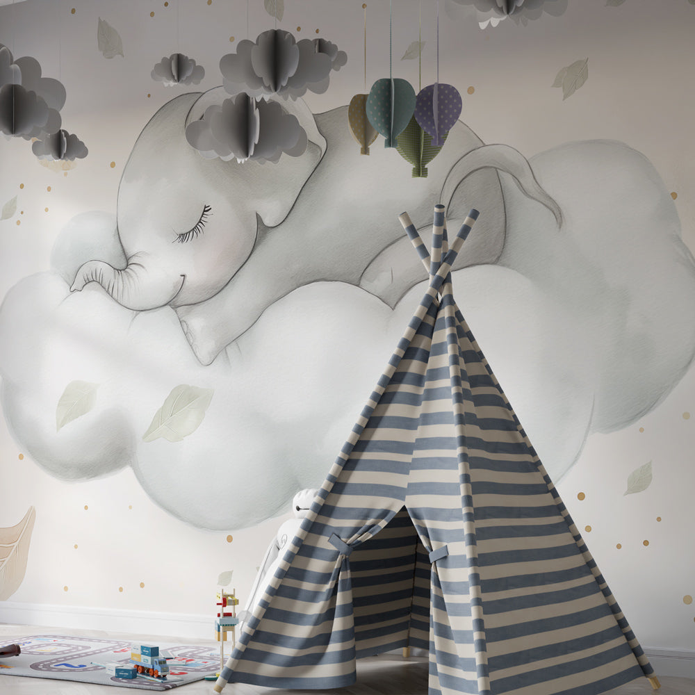 Gentle elephant mural wallpaper with floating leaves for calm baby room environment
