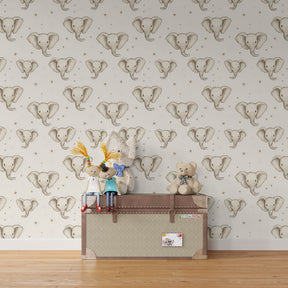 Elephant nursery wallpaper with golden stars on cream background for toddler bedroom