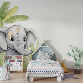 Safari elephant wallpaper creating jungle atmosphere in children's bedroom decor