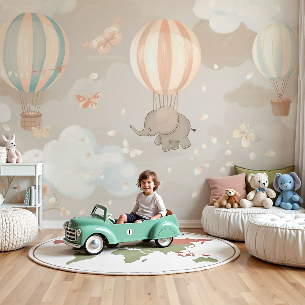 Dreamy elephant hot air balloon mural wallpaper in pastel nursery by Kids-Mundo