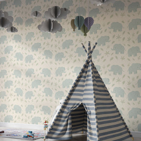 Pastel elephant wallpaper transforming kids playroom into dreamy animal sanctuary