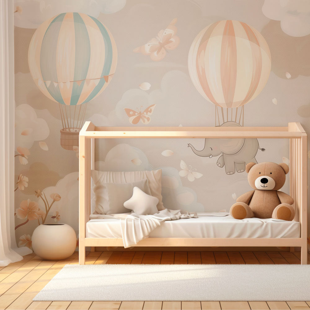 Pastel elephant mural wallpaper with hot air balloons for toddler room by Kids-Mundo